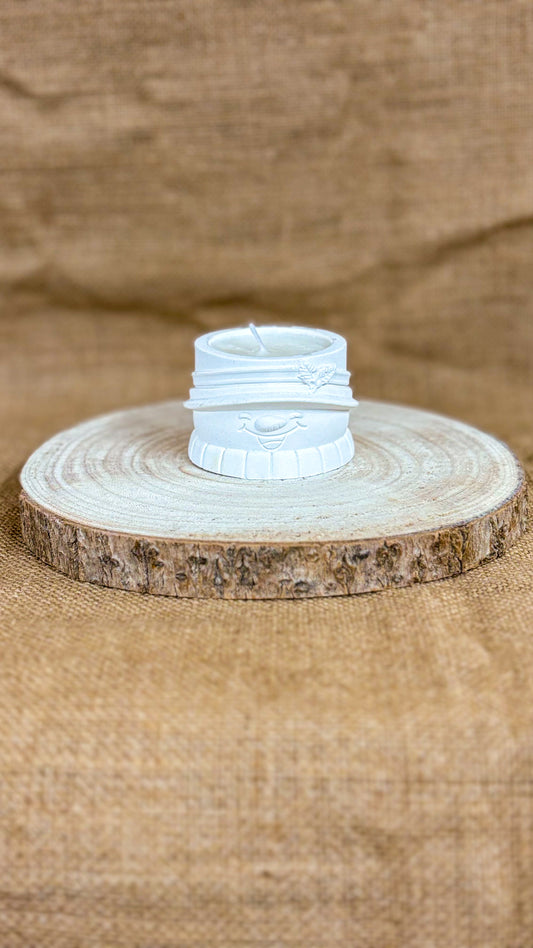 Testa di Neve – Mini candela natalizia in gesso ceramico